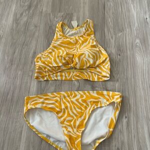 Like new Freely swim suit set both are size large only worn one time